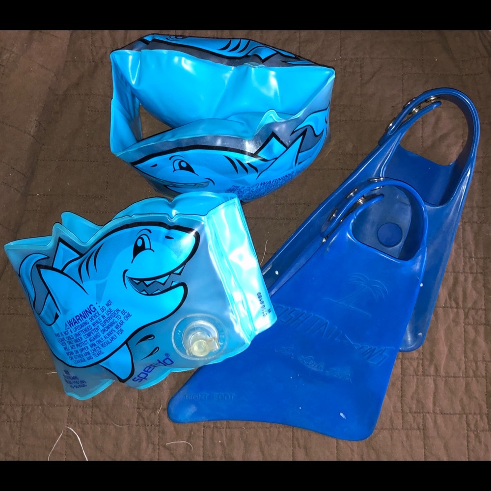 Speedo floaties and blue swim flippers